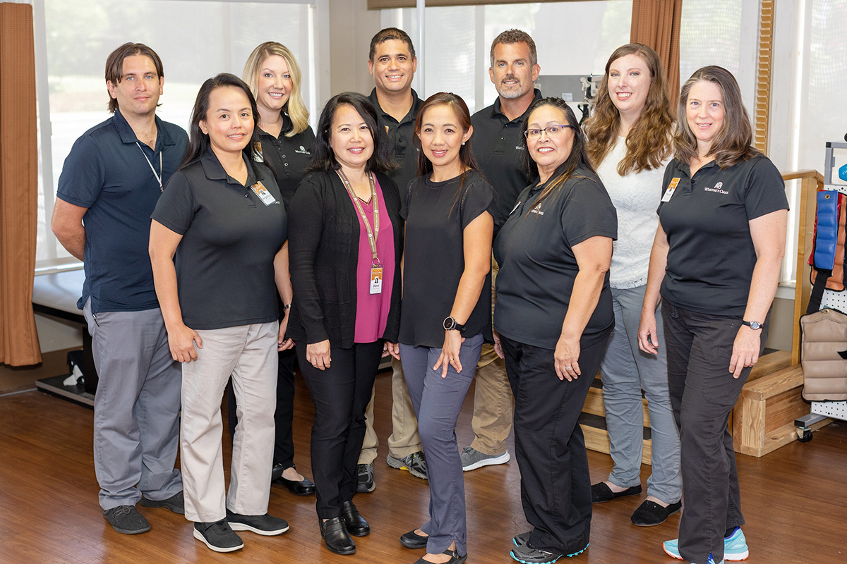 A group of employees at Whitney Oaks